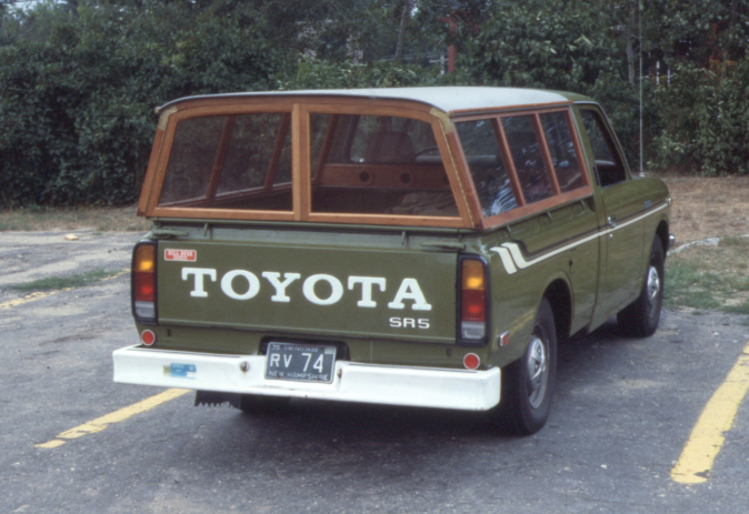 Toyota Truck and camper top made from cherrywood and plexus panels.