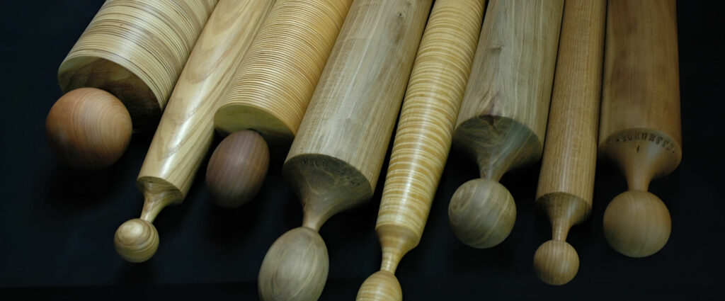 A selection of wooden rolling pins.